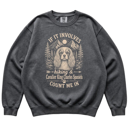 Pepper Comfort Colors® sweatshirt featuring Hiking and Cavalier King Charles Spaniels, laid-flat presentation
