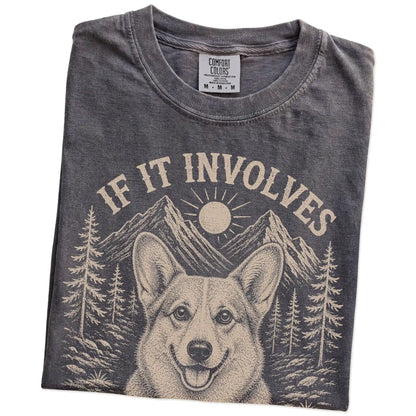 Folded Pepper Comfort Colors® T-shirt showing Corgi hiking design with mountain scenery