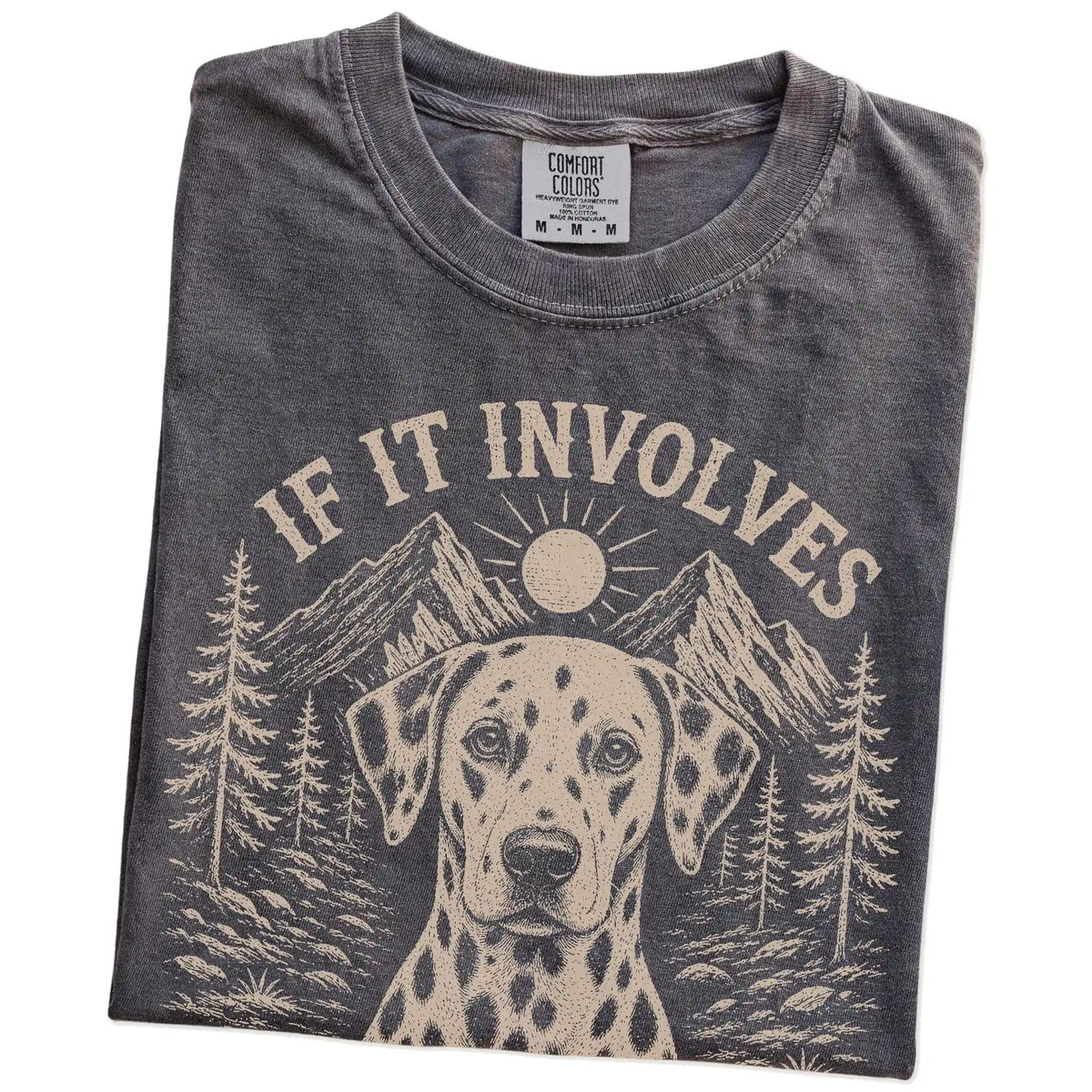Folded Pepper Comfort Colors® T-shirt showing Dalmatian hiking design with mountain scenery