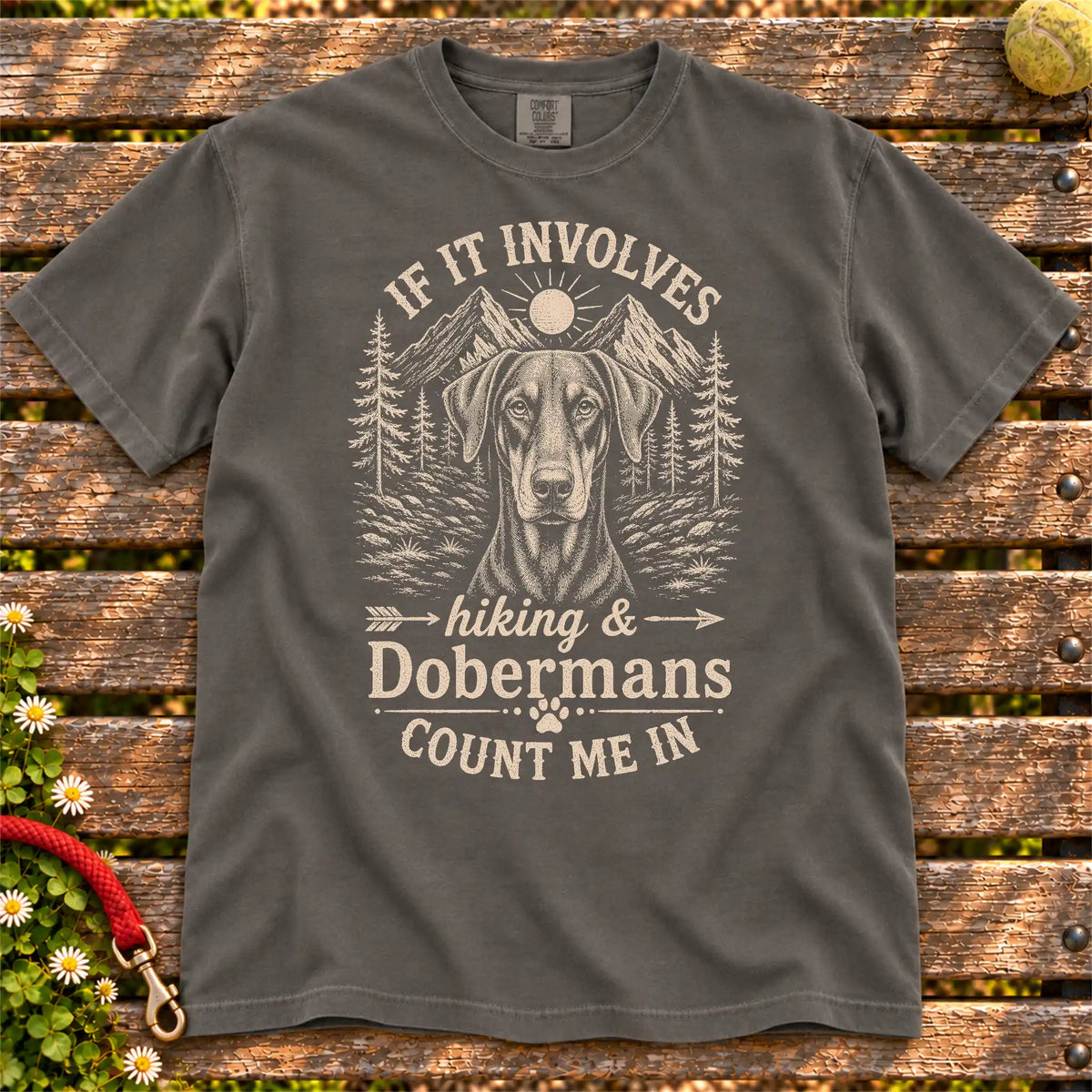 Hiking and Dobermans design on a Pepper Comfort Colors T-shirt, shown flat