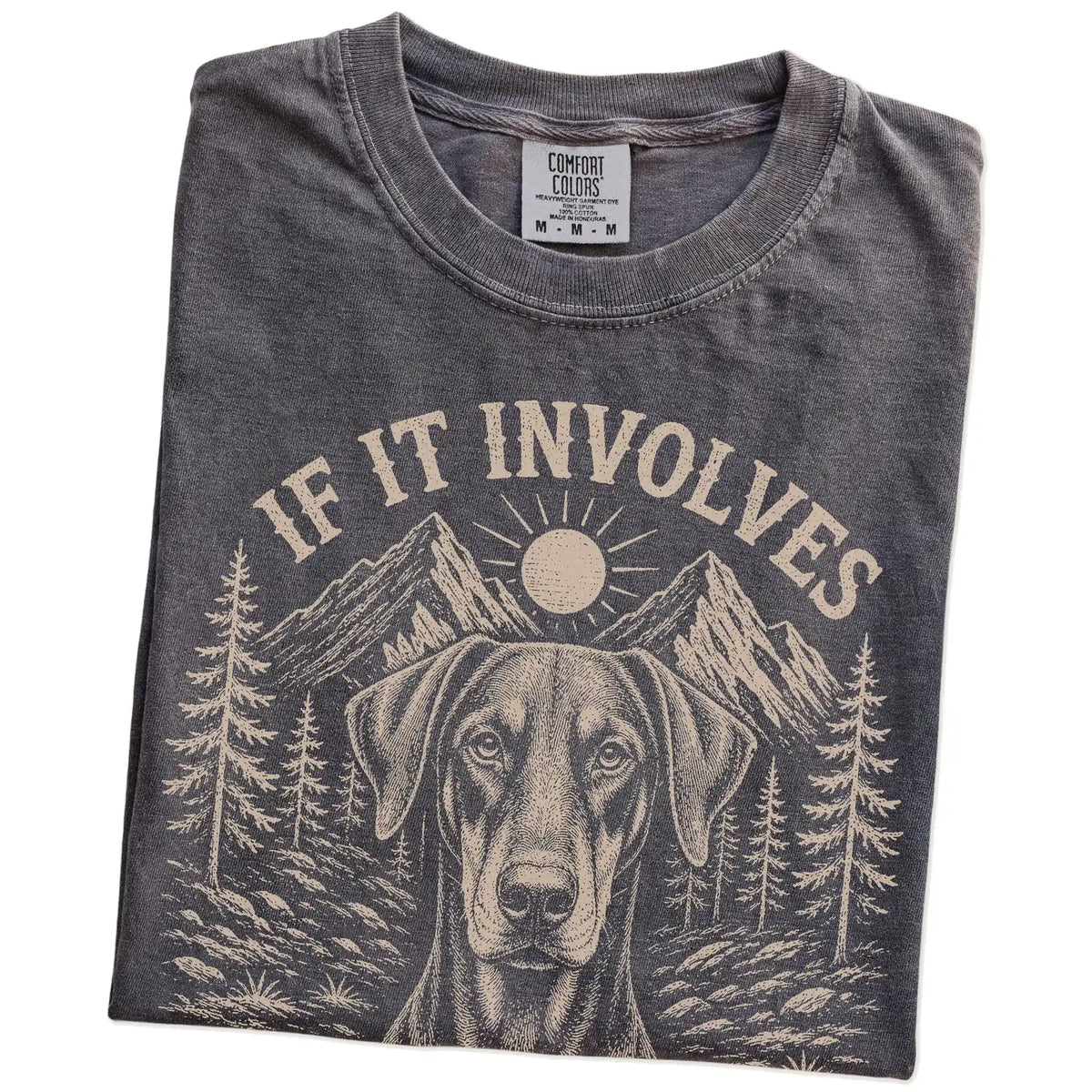 Folded Pepper Comfort Colors® T-shirt showing Doberman hiking design with mountain scenery