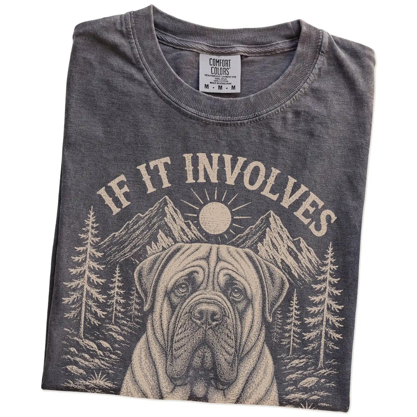 Folded Pepper Comfort Colors® T-shirt showing Mastiff hiking design with mountain scenery