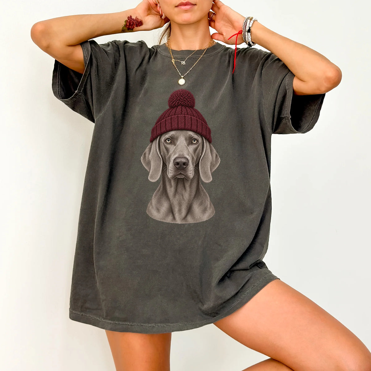 Woman wearing a Pepper Weimaraner hipster T-shirt with a maroon-beanie dog portrait