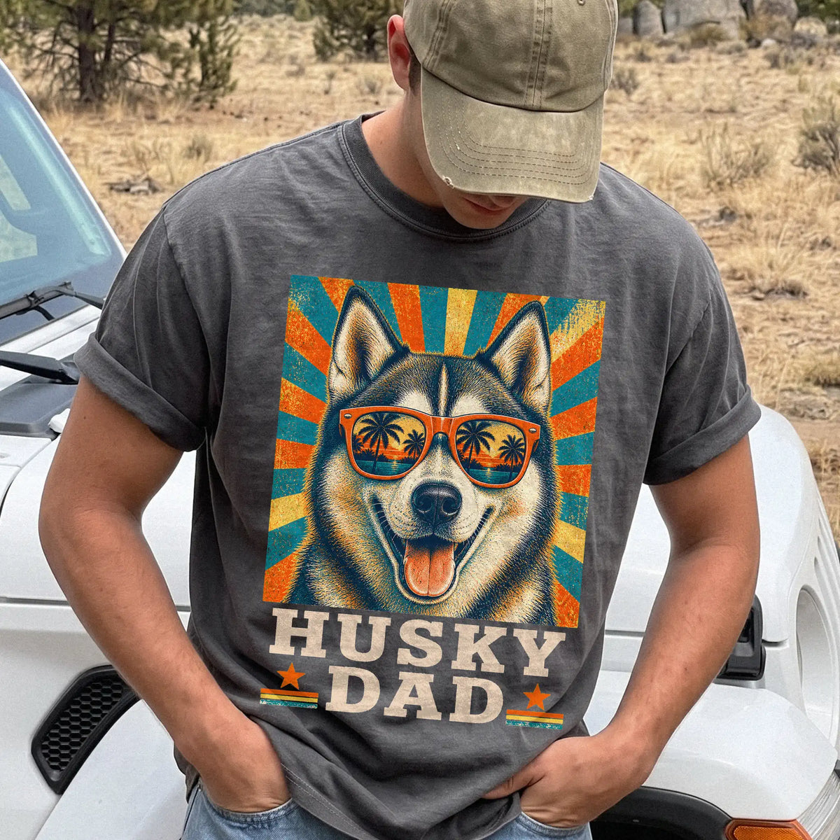 Retro Husky Dad design on a Pepper Comfort Colors T-shirt worn by a model