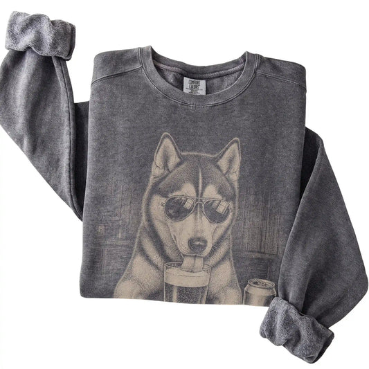 Pepper Husky drinking from a pint at a bar, folded detail view