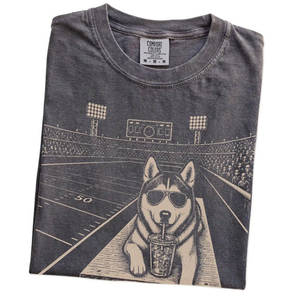 Folded Pepper Comfort Colors® T-shirt showing Husky ready for football and tailgate season