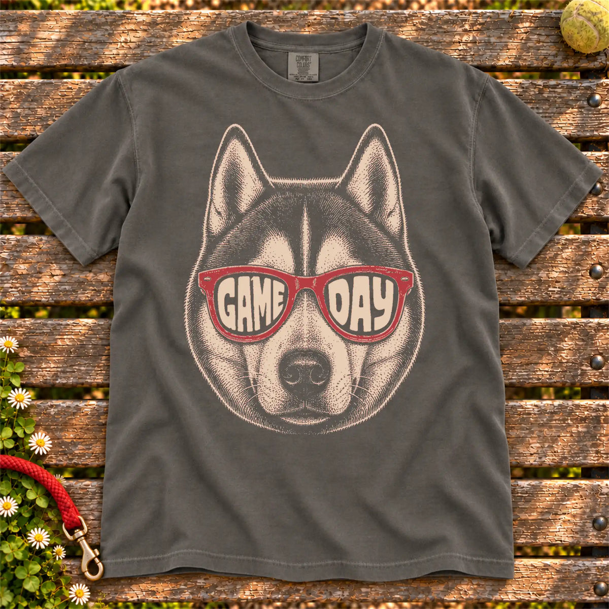 Husky Game Day design on a Pepper Comfort Colors T-shirt, shown flat