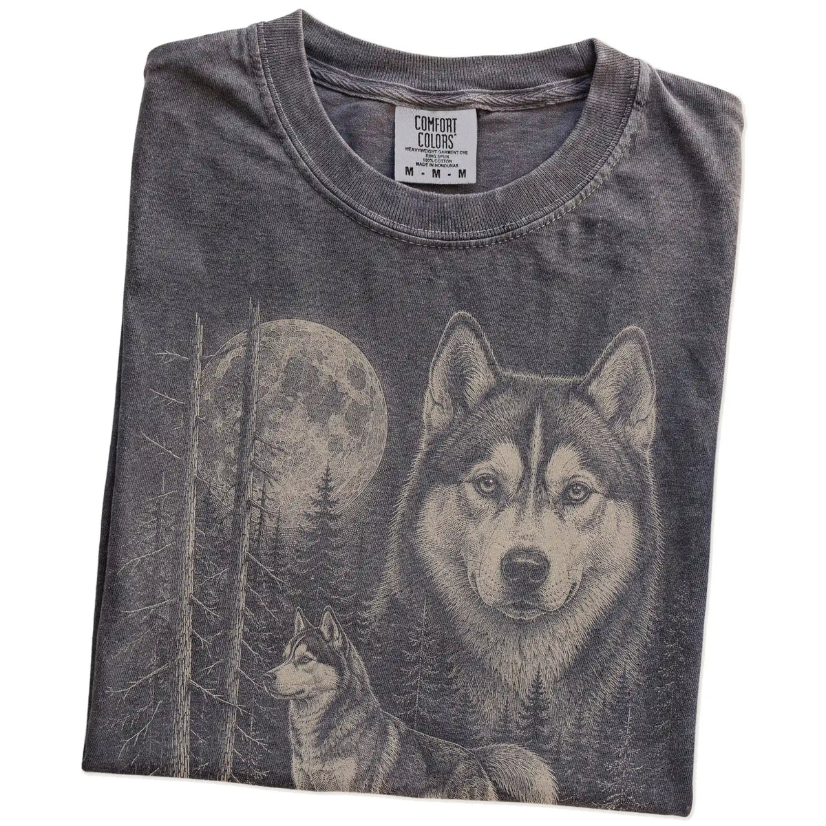 Folded Pepper Husky Moonlit Forest T-Shirt showing the graphic