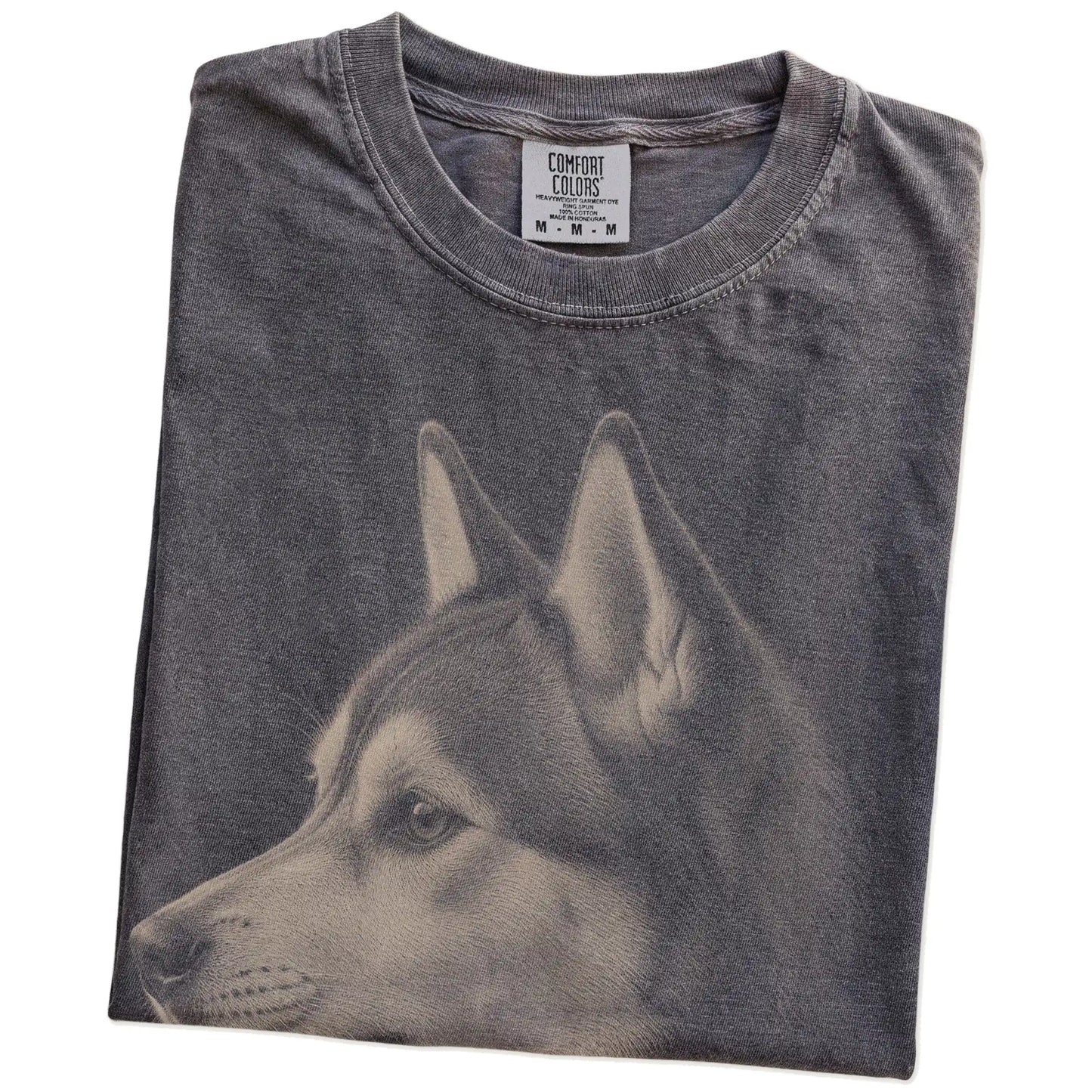 Folded Pepper Comfort Colors® T-shirt showing a detailed Husky portrait