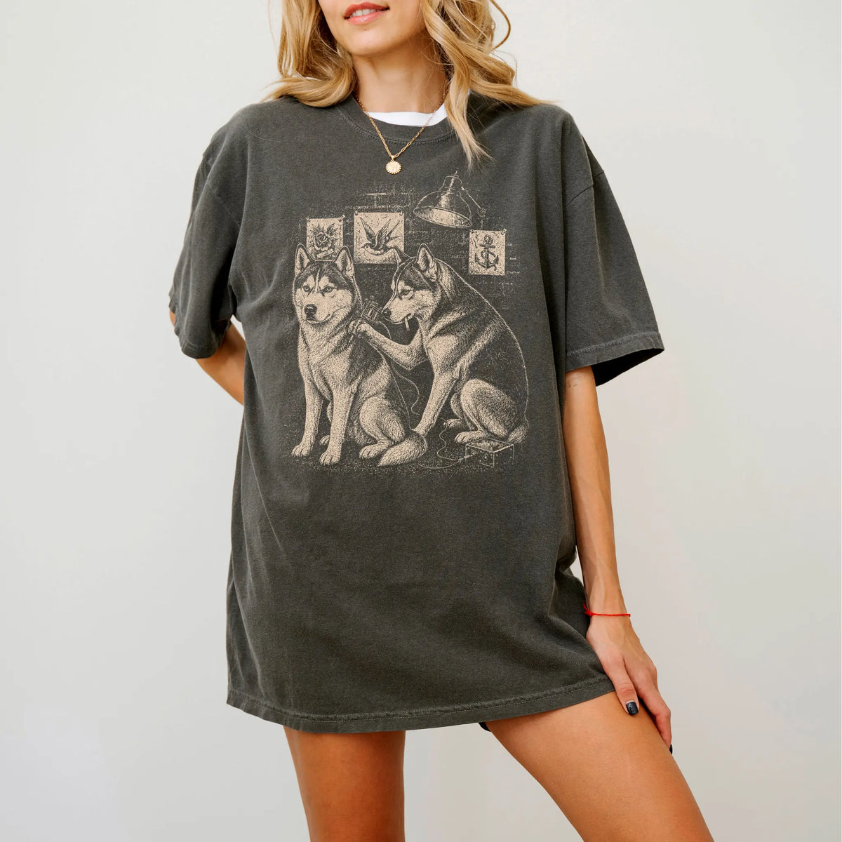 Person wearing a Pepper Husky Tattoo t-shirt