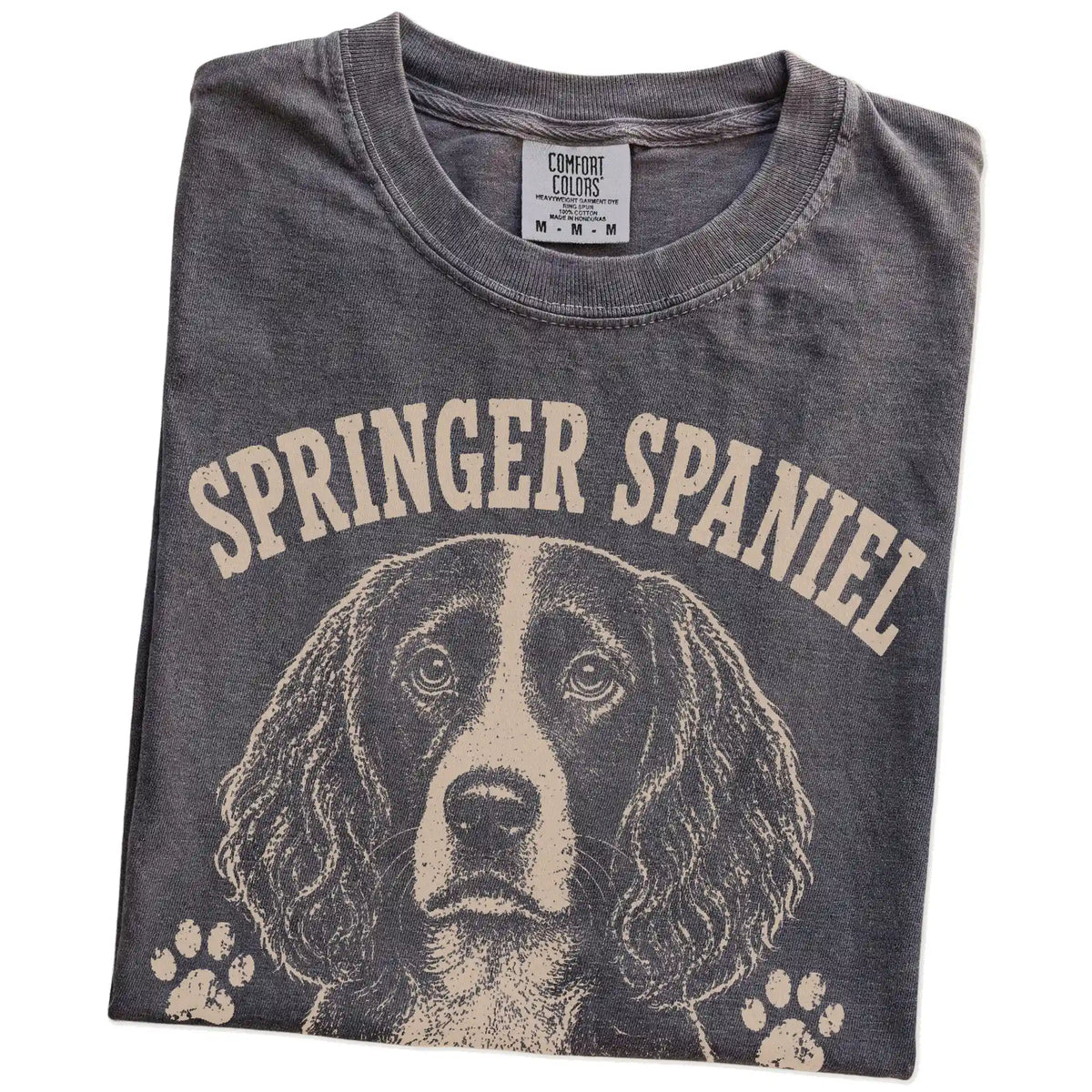 Folded Pepper Comfort Colors® T-shirt showing Springer Spaniel design with “I Bring The Bounce” lettering