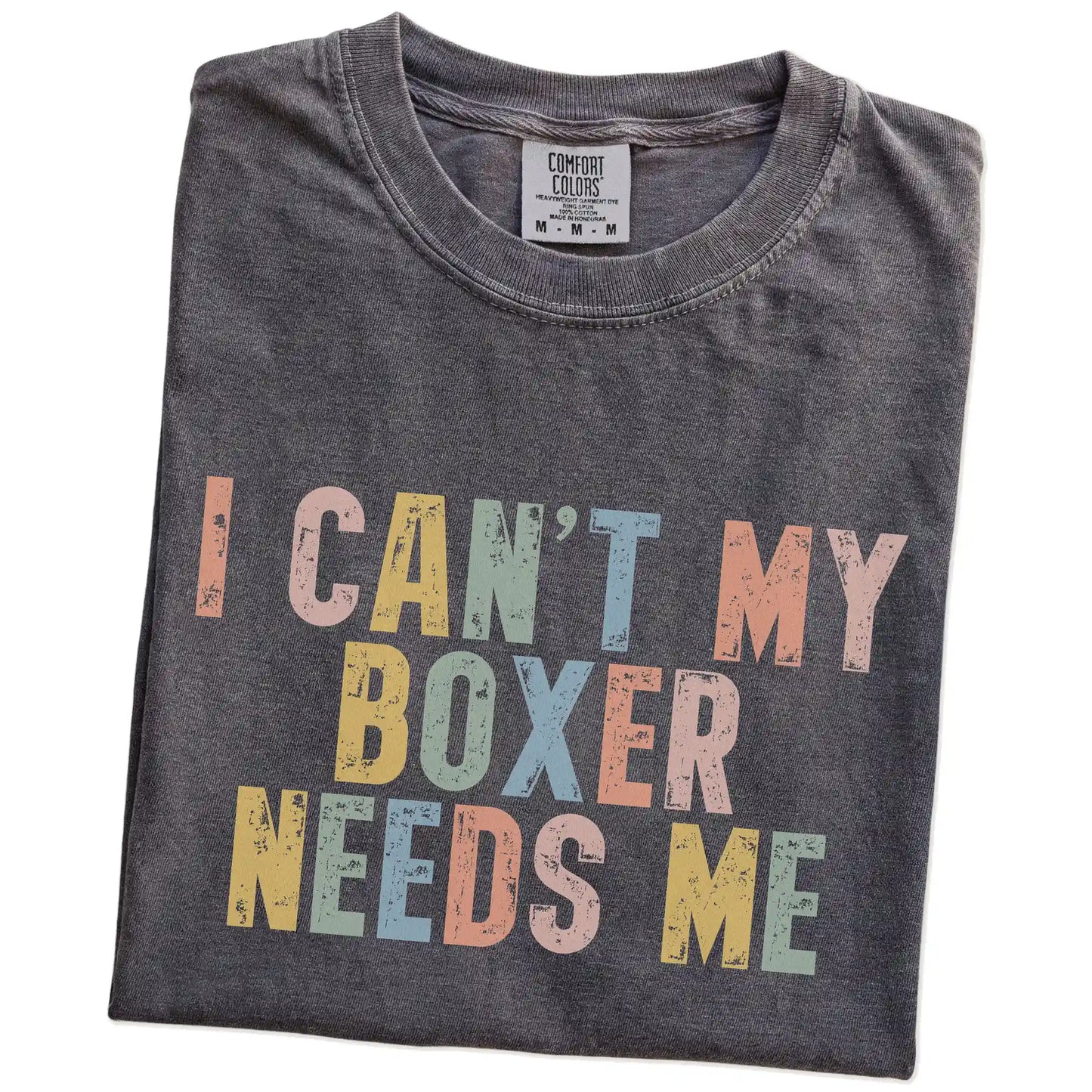 Folded Pepper Comfort Colors® T-shirt showing Boxer with “I Can’t, My Dog Needs Me” lettering