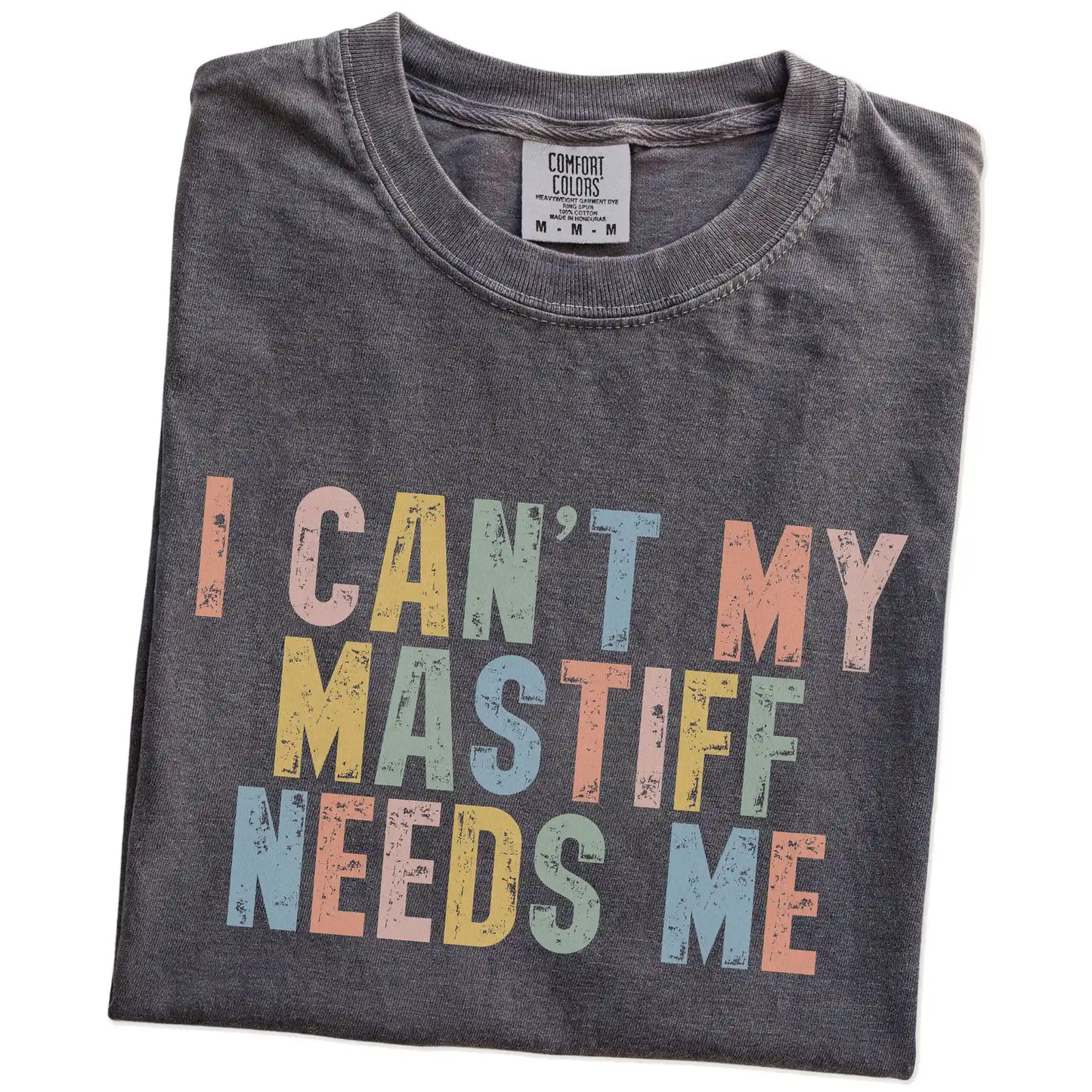 Folded Pepper Comfort Colors® T-shirt showing Mastiff with “I Can’t, My Dog Needs Me” lettering