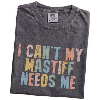 Folded Pepper Comfort Colors® T-shirt showing Mastiff with “I Can’t, My Dog Needs Me” lettering