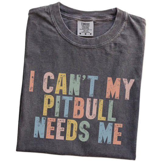 Folded Pepper Comfort Colors® T-shirt showing Pitbull with “I Can’t, My Dog Needs Me” lettering