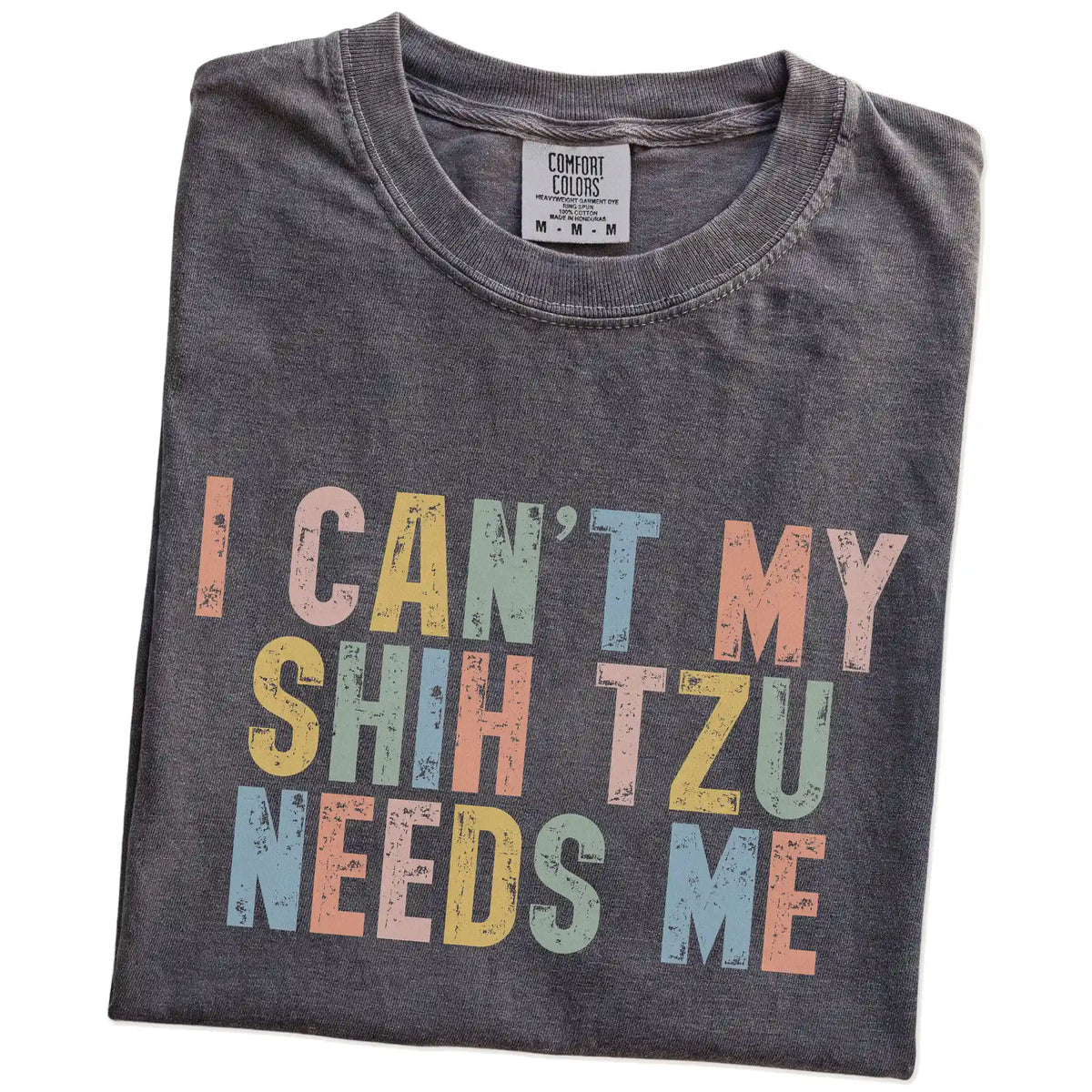 Folded Pepper Comfort Colors® T-shirt showing Shih Tzu with “I Can’t, My Dog Needs Me” lettering