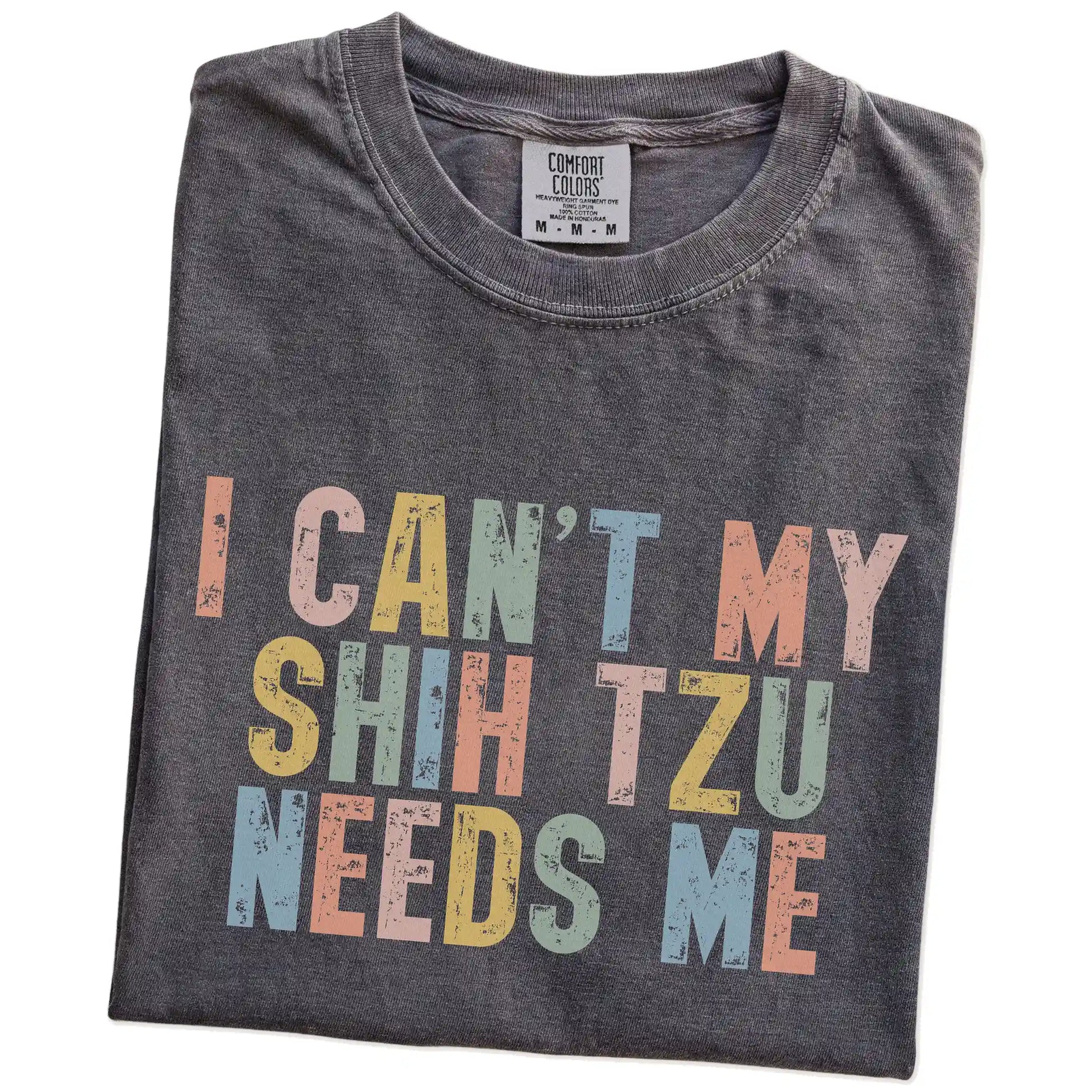 Folded Pepper Comfort Colors® T-shirt showing Shih Tzu with “I Can’t, My Dog Needs Me” lettering