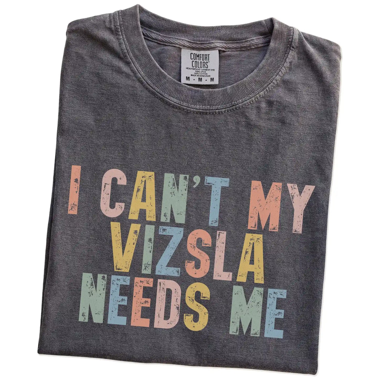 Folded Pepper Comfort Colors® T-shirt showing Vizsla with “I Can’t, My Dog Needs Me” lettering