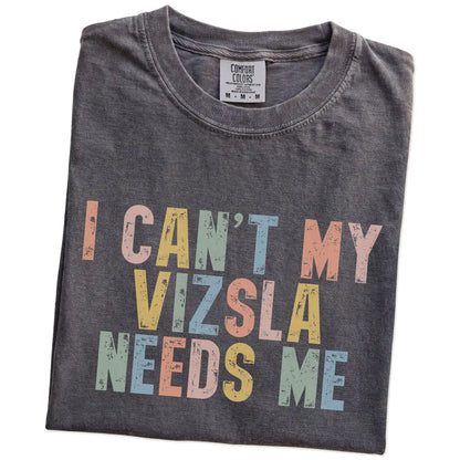 Folded Pepper Comfort Colors® T-shirt showing Vizsla with “I Can’t, My Dog Needs Me” lettering