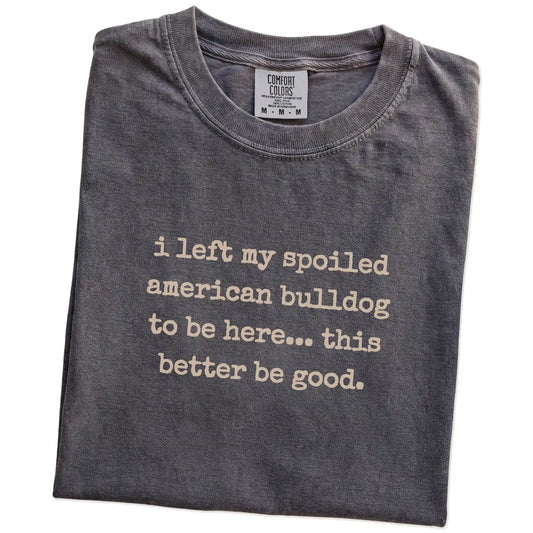 Folded Pepper Comfort Colors® T-shirt showing the “I Left My Spoiled American Bulldog Home” saying