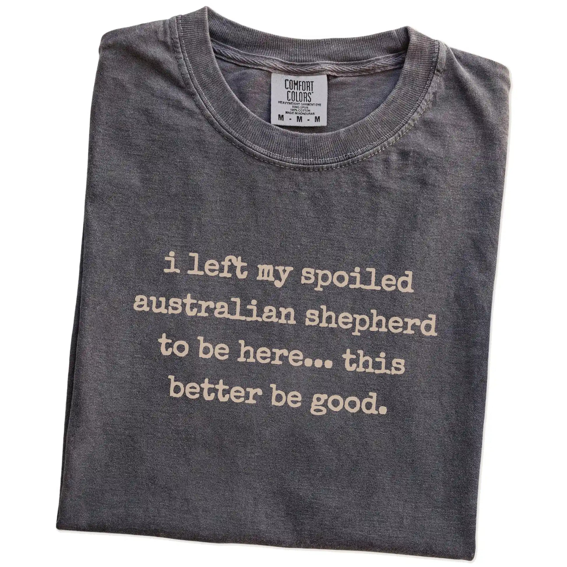 Folded Pepper Comfort Colors® T-shirt showing Australian Shepherd “I Left My Spoiled Dog Home” saying