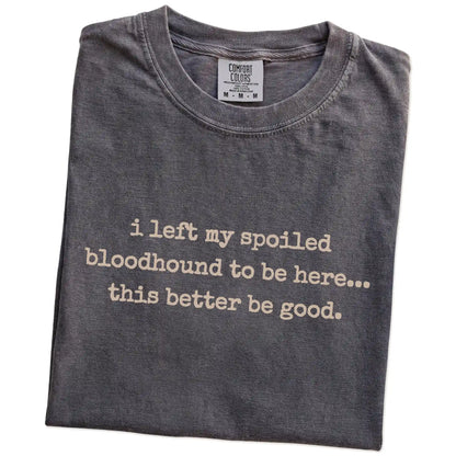 Folded Pepper Comfort Colors® T-shirt showing the “I Left My Spoiled Bloodhound Home” saying
