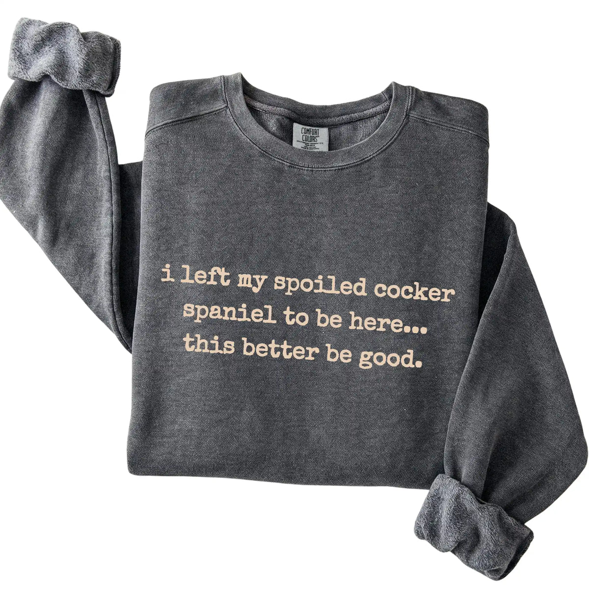 Pepper I Left My Spoiled Cocker Spaniel Comfort Colors sweatshirt folded to show the printed design