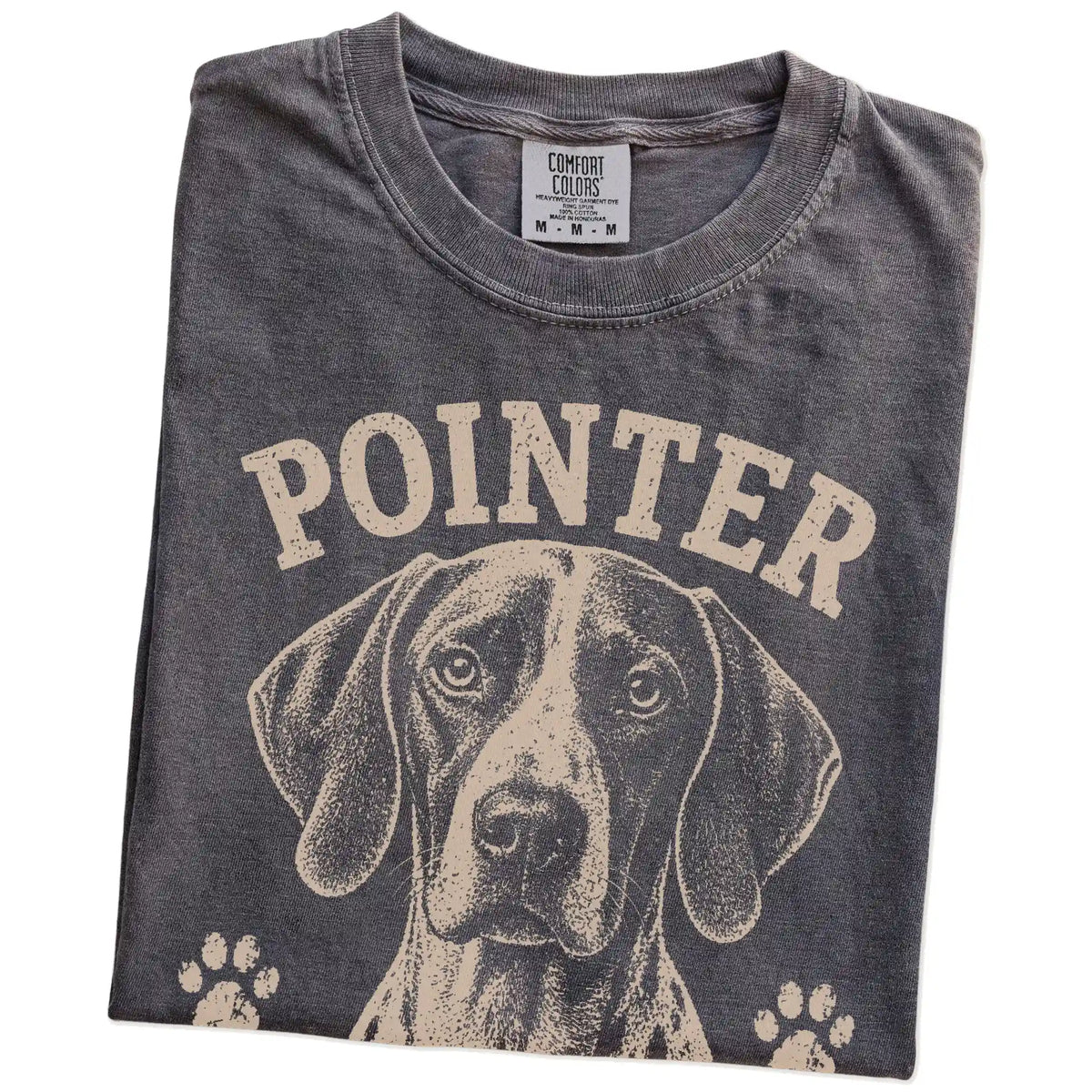 Folded Pepper Comfort Colors® T-shirt showing Pointer design with “I Make A Point Of Everything” lettering