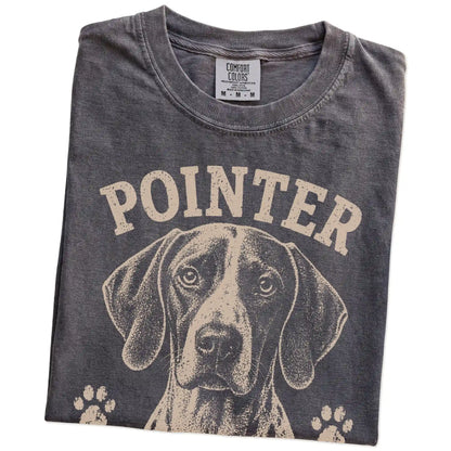 Folded Pepper Comfort Colors® T-shirt showing Pointer design with “I Make A Point Of Everything” lettering