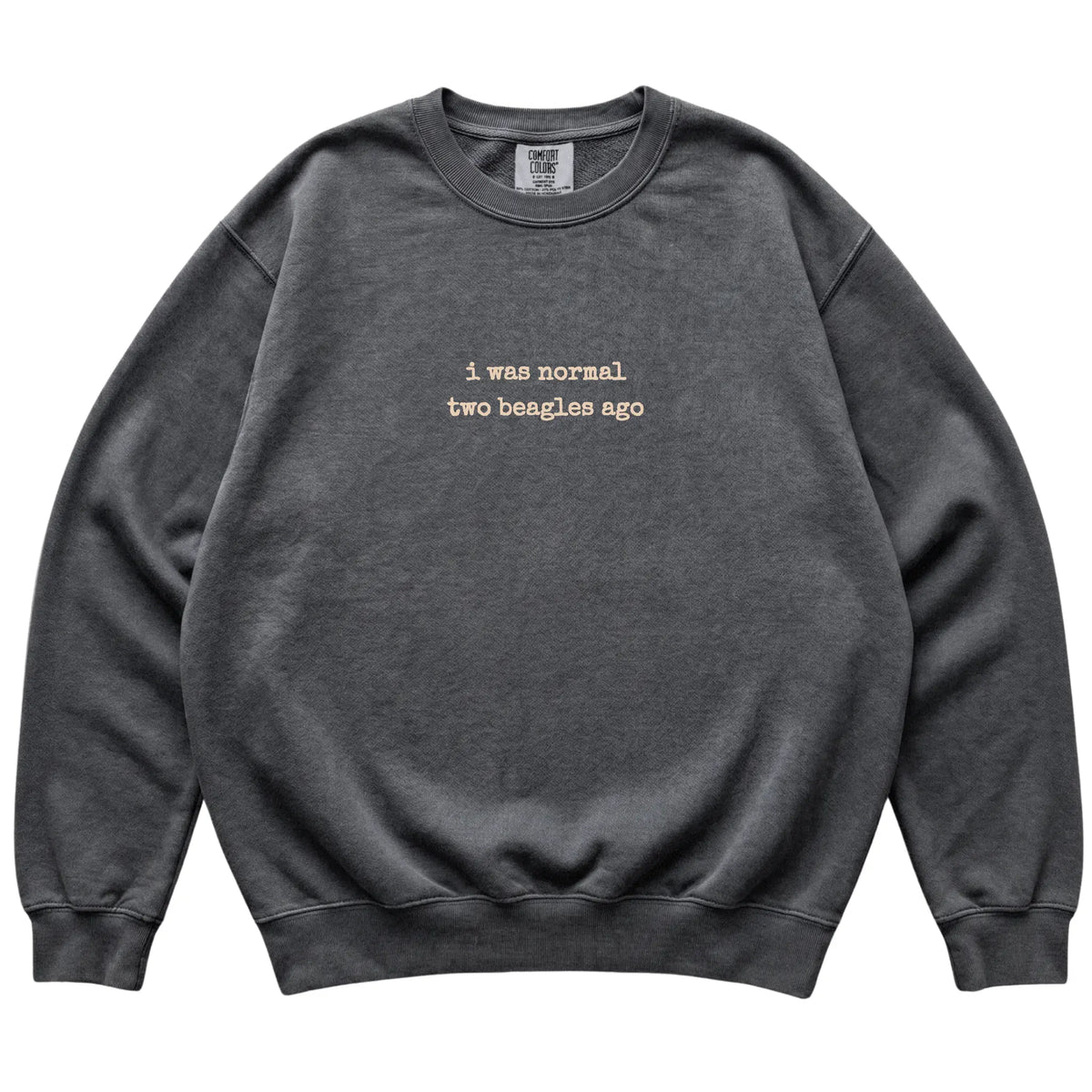 Pepper I Was Normal Two Beagles Ago Comfort Colors sweatshirt laid flat