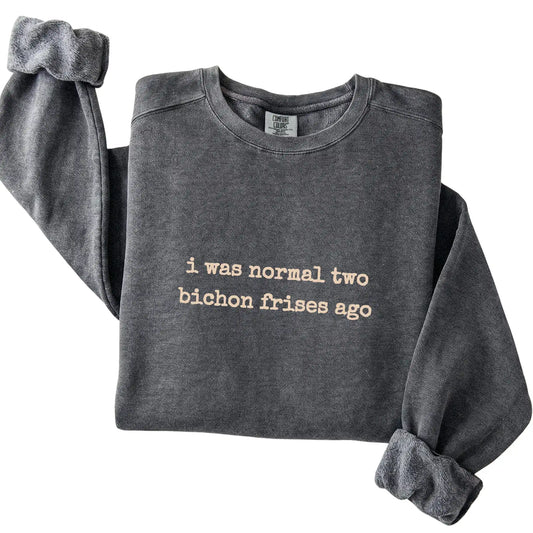 Pepper I Was Normal Two Bichon Frises Ago Comfort Colors sweatshirt folded to show the printed design