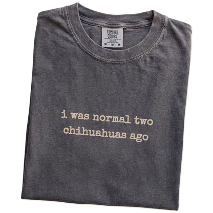 Folded Pepper Comfort Colors® T-shirt showing i was normal two chihuahuas ago lettering