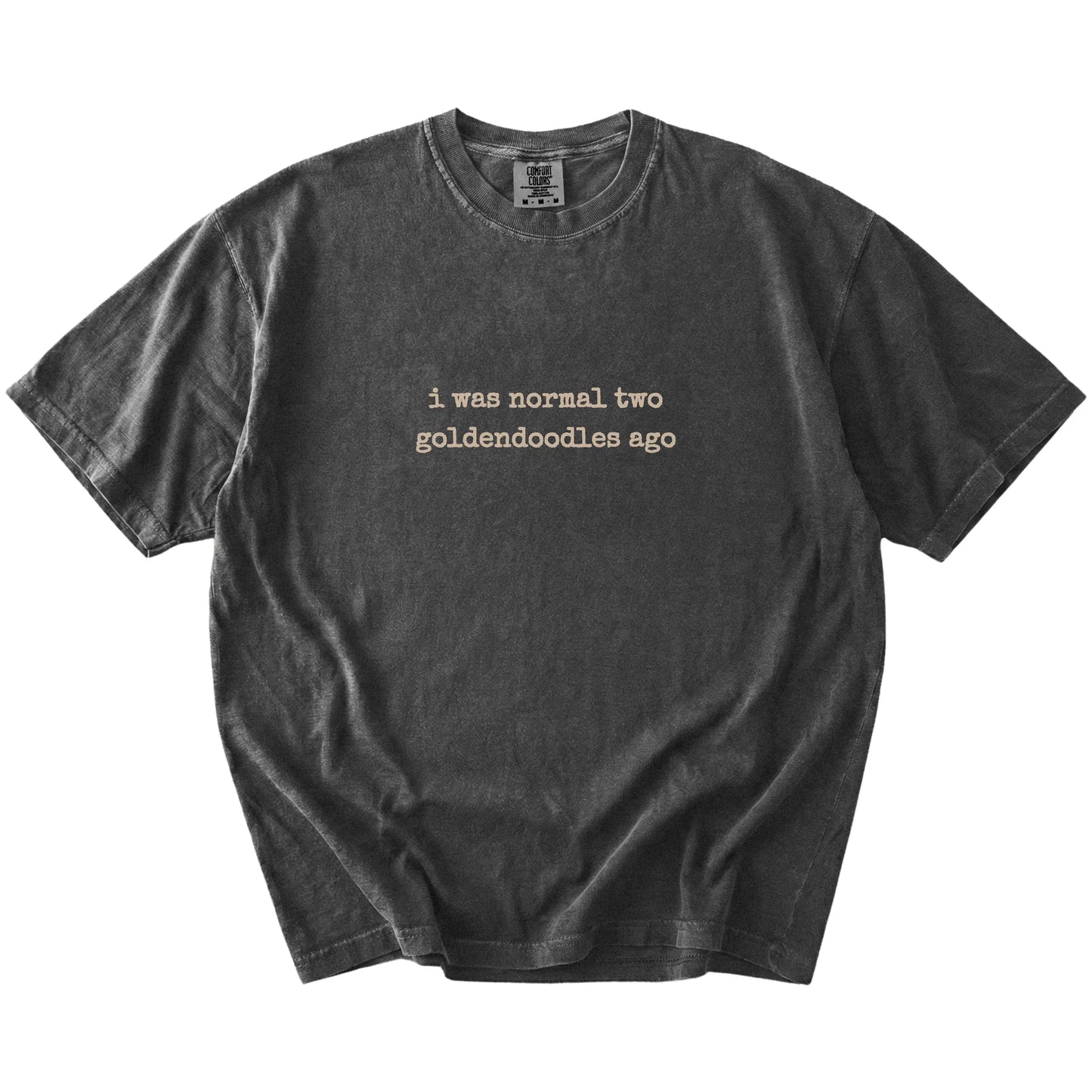 I Was Normal Two Goldendoodles Ago lettering on a Pepper Comfort Colors® T-shirt