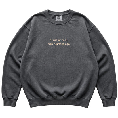 Pepper I Was Normal Two Newfies Ago Comfort Colors sweatshirt laid flat