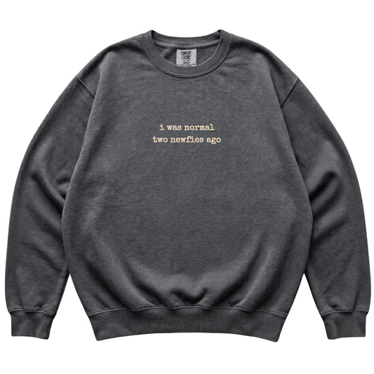 Pepper I Was Normal Two Newfies Ago Comfort Colors sweatshirt laid flat