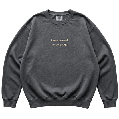 Pepper I Was Normal Two Pugs Ago Comfort Colors sweatshirt laid flat