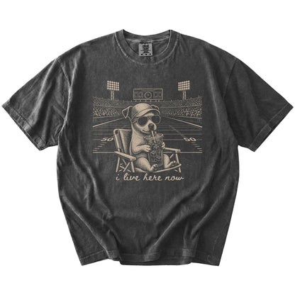 Jack Russell claiming the football field with “I Live Here Now” lettering on a Pepper Comfort Colors® T-shirt