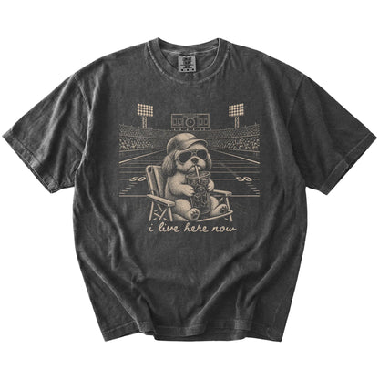Shih Tzu claiming the football field with “I Live Here Now” lettering on a Pepper Comfort Colors® T-shirt