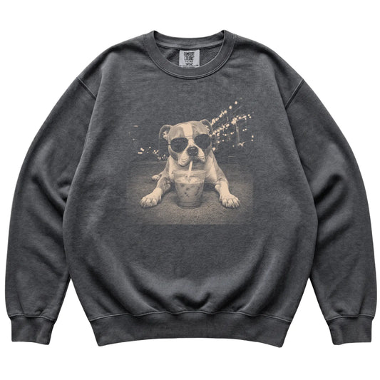 American Bulldog wearing aviator sunglasses and drinking iced coffee on a Pepper Comfort Colors 1566 Sweatshirt, flat lay view