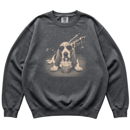 Basset Hound wearing aviator sunglasses and drinking iced coffee on a Pepper Comfort Colors 1566 Sweatshirt, flat lay view