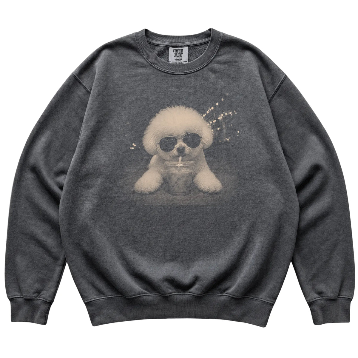 Bichon Frise wearing aviator sunglasses and drinking iced coffee on a Pepper Comfort Colors 1566 Sweatshirt, flat lay view