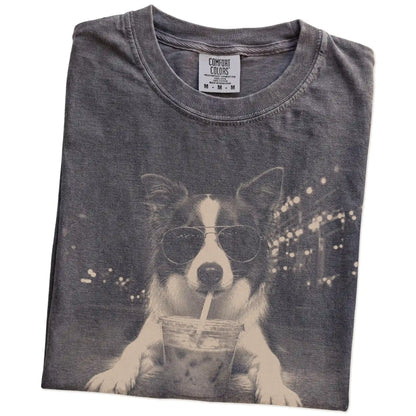 Folded Pepper Comfort Colors® T-shirt showing Border Collie with iced coffee in a retro grunge design