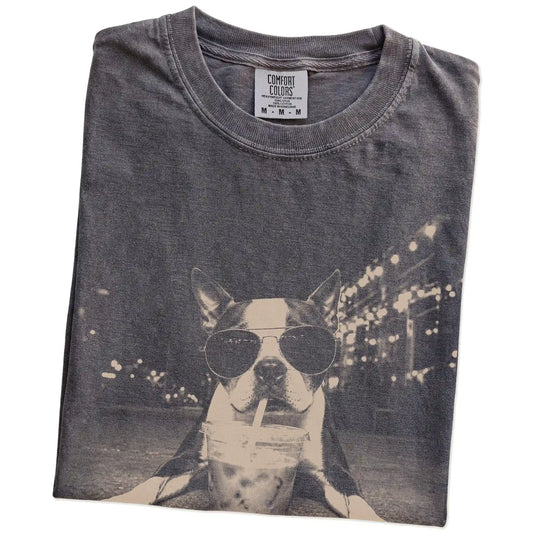 Folded Pepper Comfort Colors® T-shirt showing Boston Terrier with iced coffee in a retro grunge design
