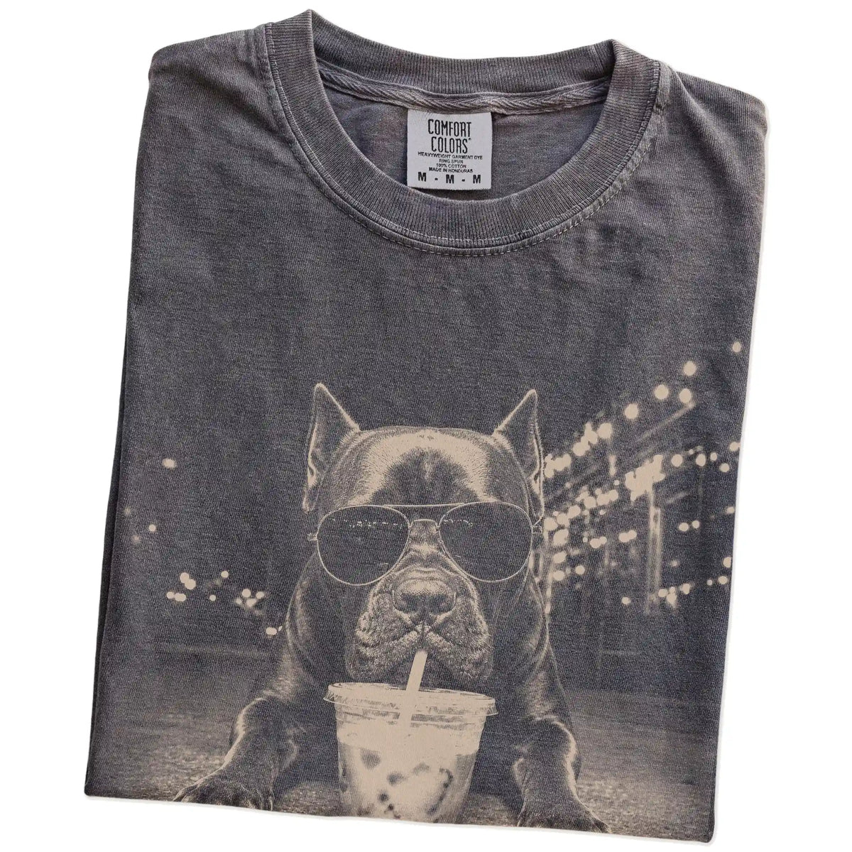 Folded Pepper Comfort Colors® T-shirt showing Cane Corso with iced coffee in a retro grunge design
