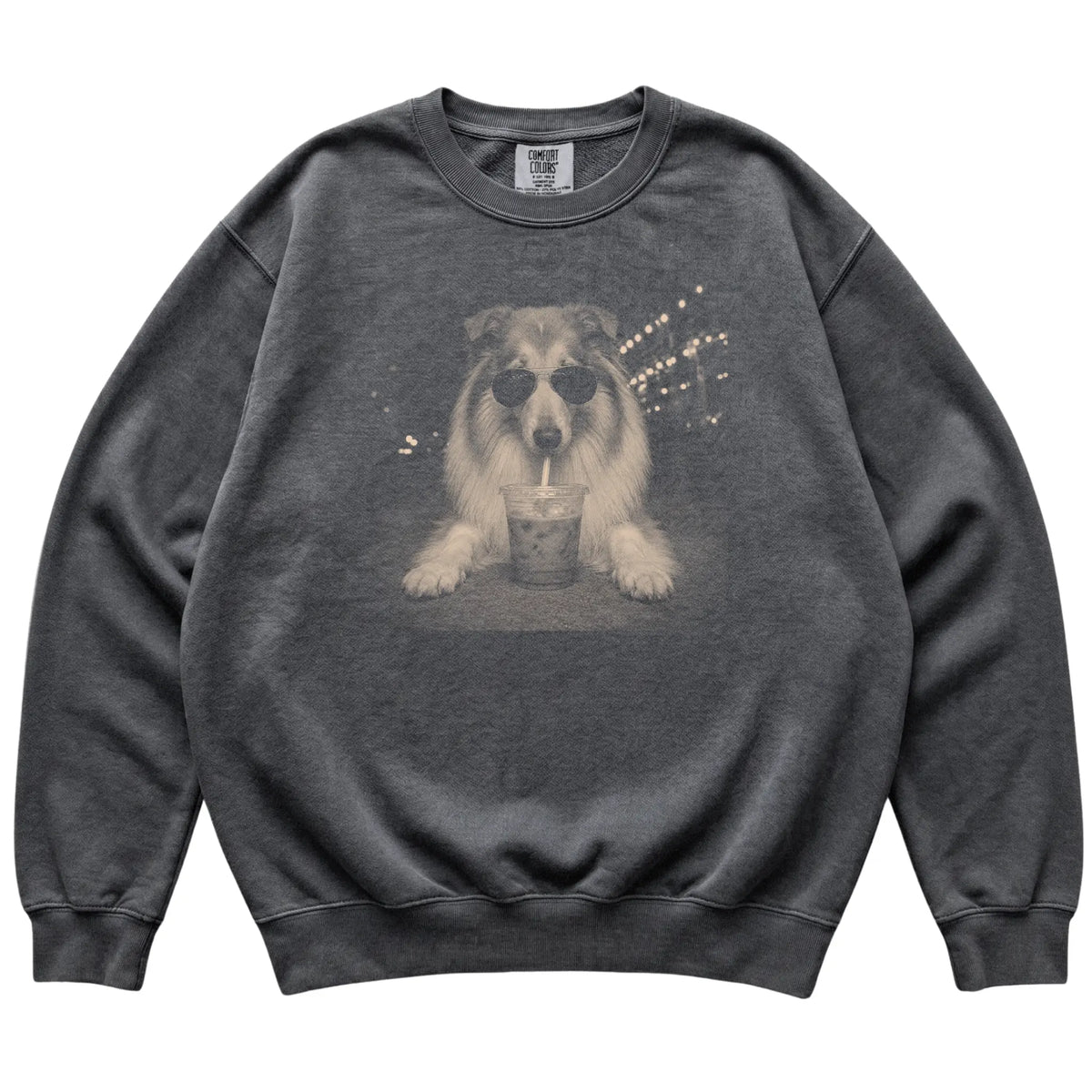 Collie wearing aviator sunglasses and drinking iced coffee on a Pepper Comfort Colors 1566 Sweatshirt, flat lay view