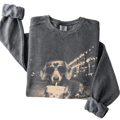 Dachshund wearing aviator sunglasses and drinking iced coffee on a Pepper Comfort Colors 1566 Sweatshirt, folded view