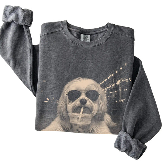Havanese wearing aviator sunglasses and drinking iced coffee on a Pepper Comfort Colors 1566 Sweatshirt, folded view