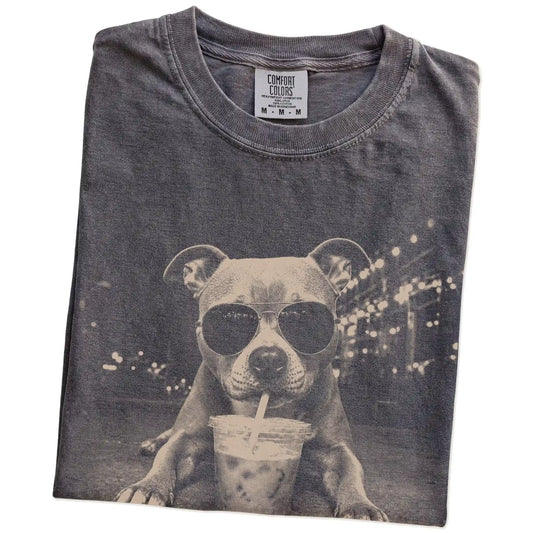 Folded Pepper Comfort Colors® T-shirt showing Pitbull with iced coffee in a retro grunge design