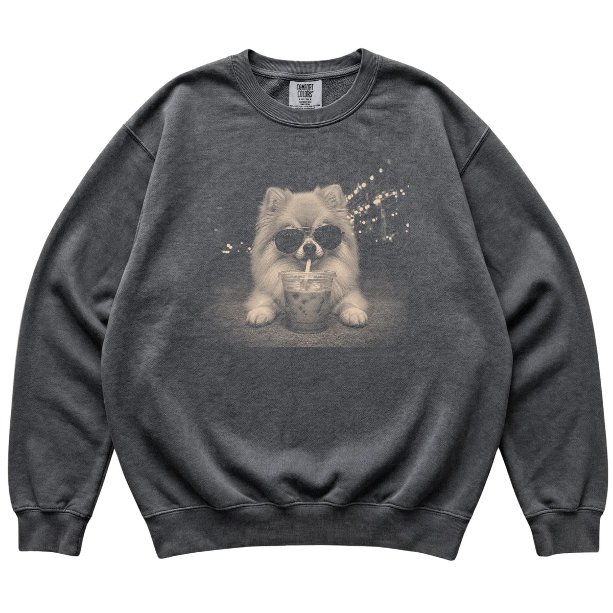 Pomeranian wearing aviator sunglasses and drinking iced coffee on a Pepper Comfort Colors 1566 Sweatshirt, flat lay view