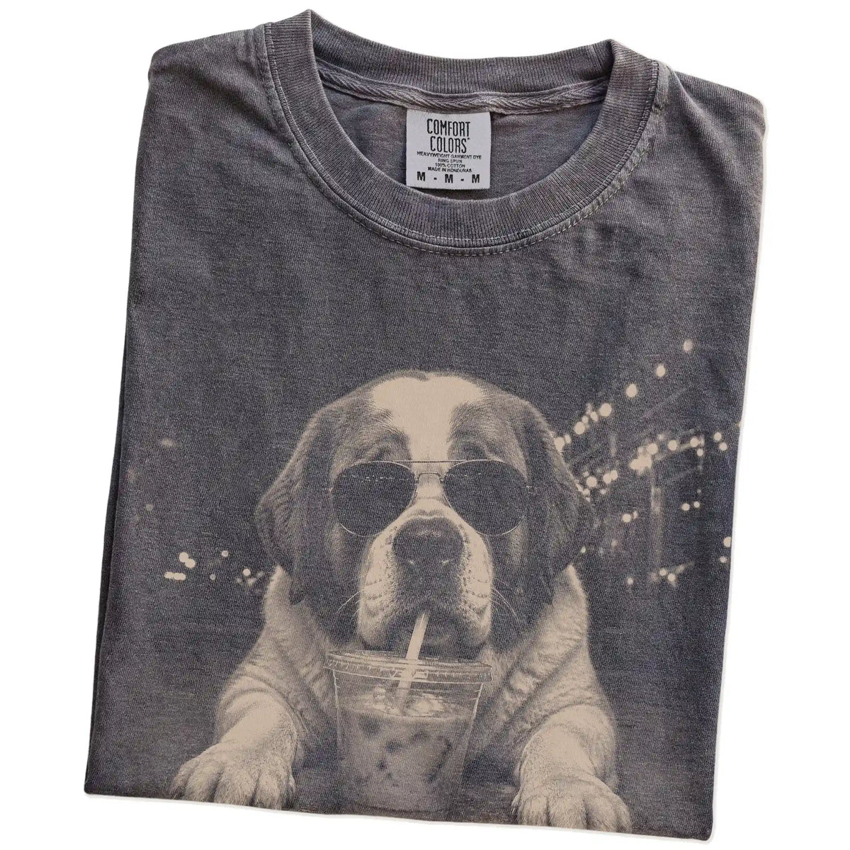 Folded Pepper Comfort Colors® T-shirt showing Saint Bernard with iced coffee in a retro grunge design
